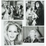 Lot of 4 original black and white photographs of Ursula Andress.   2 from the film shoot of "What'