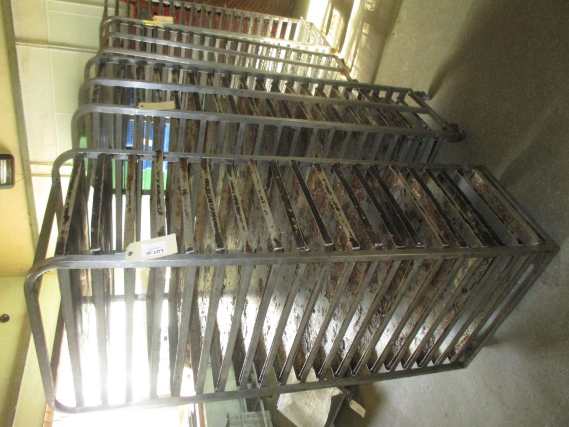 2 Metal trolleys with – 20 baking trays per trolley