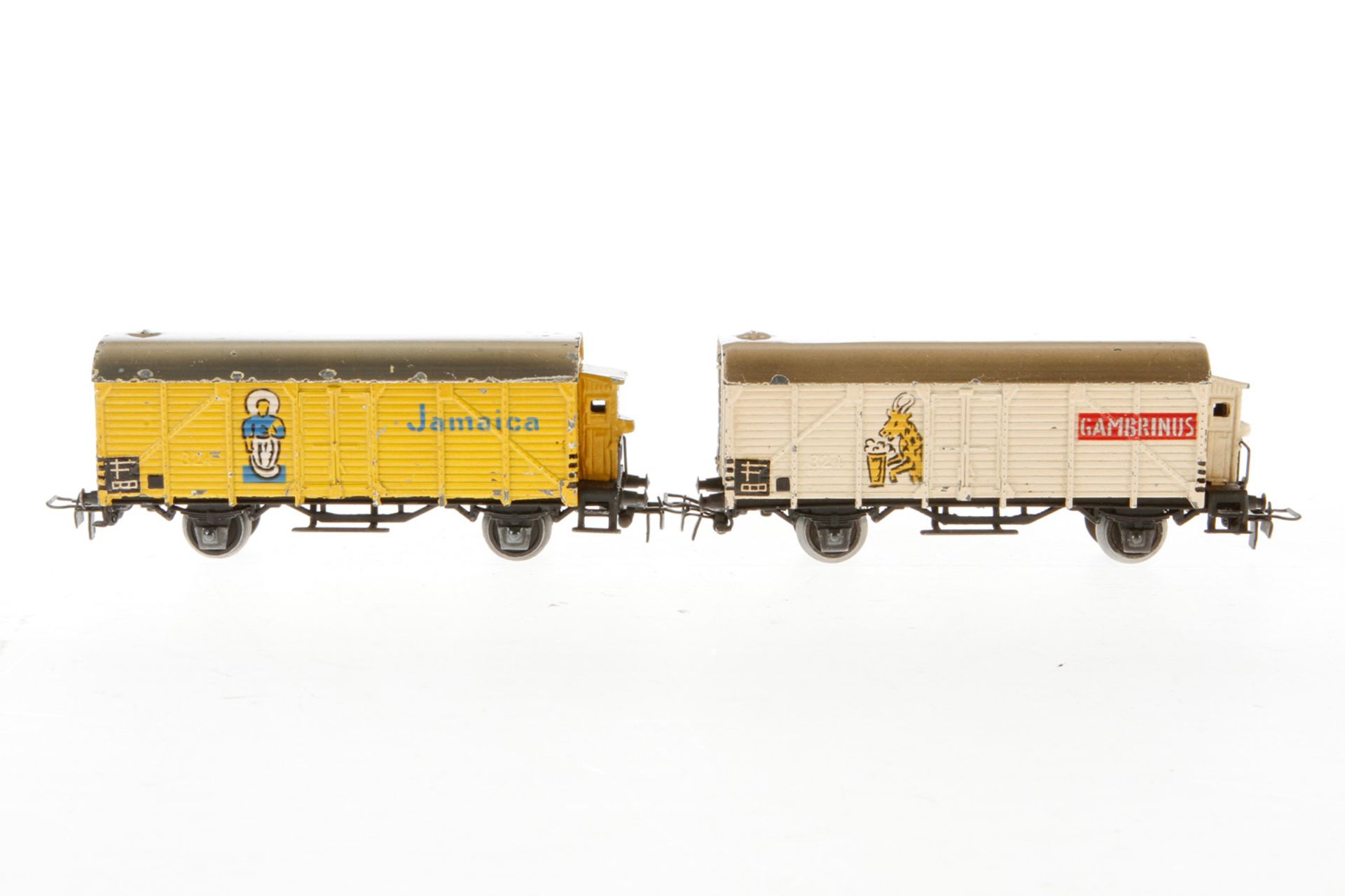 2 Märklin Güterwagen, S H0, Guss: Bananenwg. 326, gelb und Bierwg. 325, tw Lackschäden, Alterungs-