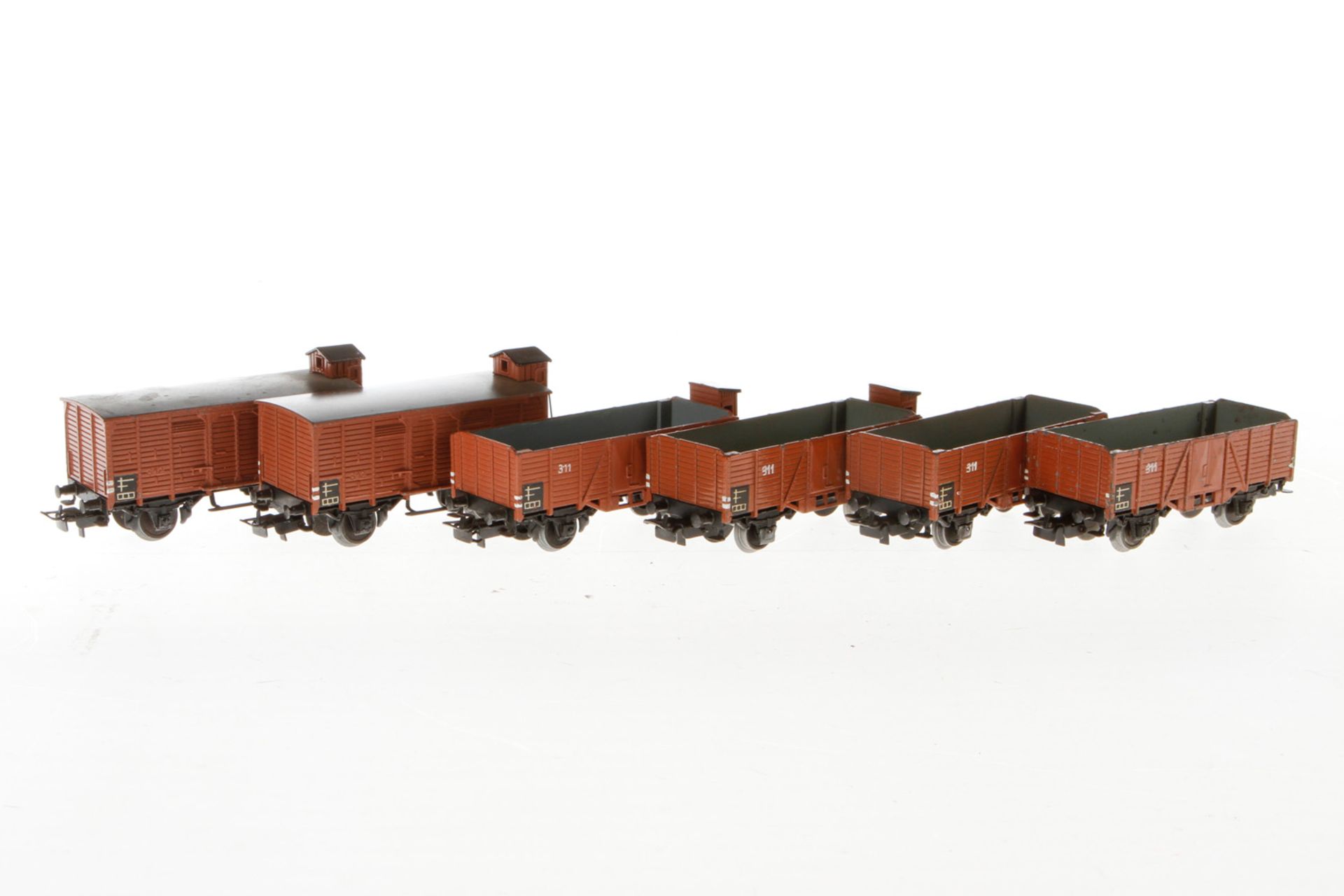 6 Märklin Güterwagen, S H0, Guss, braun: 2x off. Güterwg. 311, 2x 315 und 2x ged. Güterwg. 316, 4x