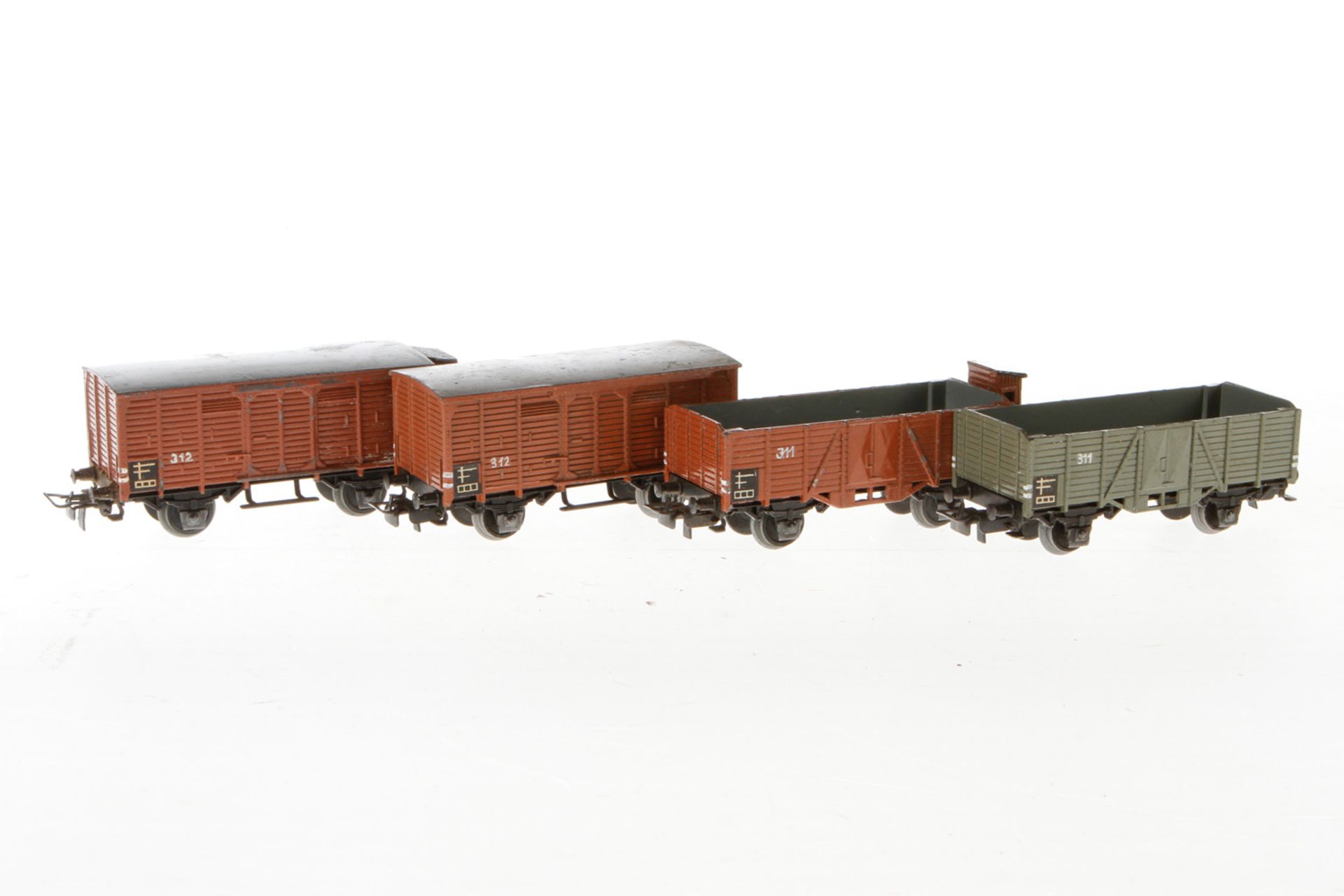 4 Märklin Güterwagen, S H0, Guss: off. Güterwg. 311, grau, 315, 312 und 316, je braun, leichte