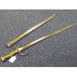 A French Chasspot Bayonet made at Mutzig in 1868 (scarce maker). In its steel scabbard. Good clean