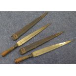 A good pair of African spear daggers. Leaf shaped blades 14", all steel construction with hollow