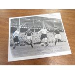Action shot picture hand signed by Jackie Milburn