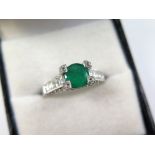 18ct White Gold Ring with central Emerald and Diamond set shoulders,Diamonds approx 1.00 carat