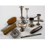 Fourteen silver items - various dates. 2 silver backed brushes, 3 flower tubs etc. Weighable