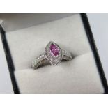 18ct White Gold Ring with central marquise pink Sapphire surrounded by Diamonds size L weight 4.6