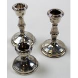 Three silver dwarf candlesticks, hallmarked for Birmingham 1972, 1973 and 1966 all B & Co.