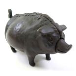 Late 19th century continental cast iron pig with clockwork ringing mechanism. H.10cm x L.18cm x W8.