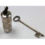 Unmarked silver miniature spice? Tower? Plus an unmarked silver key. Weight approx 65.9g