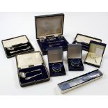 Eight boxed items, mostly silver - manicure set (part), 2 napkin rings, spoon etc. (includes a