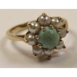 9ct Gold Ring Jade like Centre stone surrounded by split Pearls size M weight 3.2 grams