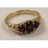 9ct Gold 3 Stone Garnet Ring size M weight 2.7 grams