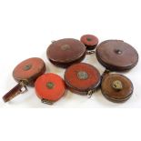 Seven tape measures (six leather cased), makers include John Rabone & sons and Chesterman