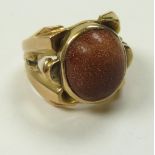 Yellow metal ring set with Sunstone like Cabochon stone size N weight 8.6 grams