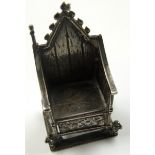 Miniature coronation chair marked 930 and F (foreign silver). Also bears British hallmarks CS and