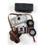Two cameras, comprising a Zeiss Ikon Movikon 8 and a Voigtlander Vito B, both in cases