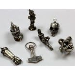 Five silver pendants (3 unhallmarked). One Norweigian (marked N M KOPI ? STERLING) and one with