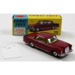 Corgi No.230 Mercedes-Benz 220SE Coupe Maroon. Mint in a Good box - marked from a label removal,