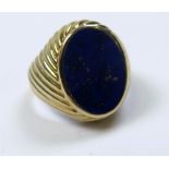 Yellow metal ring set with an oval Lapis Lazuli size N weight 6.5 grams