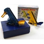 Dinky Toy Elevator Loader No 564 x2, one in yellow in an illustrated box and the other in plain