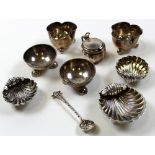 Nine silvercruet items hallmarked 1890 (1), 1895 (2), 1898 (2), 1900 (1) and 1933 (1). 2 salts