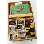 Large Meccano branded oak box, filled with Meccano pieces and instruction booklets, together with