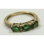 9ct Gold Ring set with 3 synthetic Green stones size J weight 1.7 grams