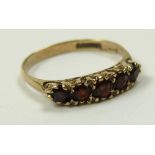 9ct Gold 5 stone Garnet set Ring size L weight 1.4 grams