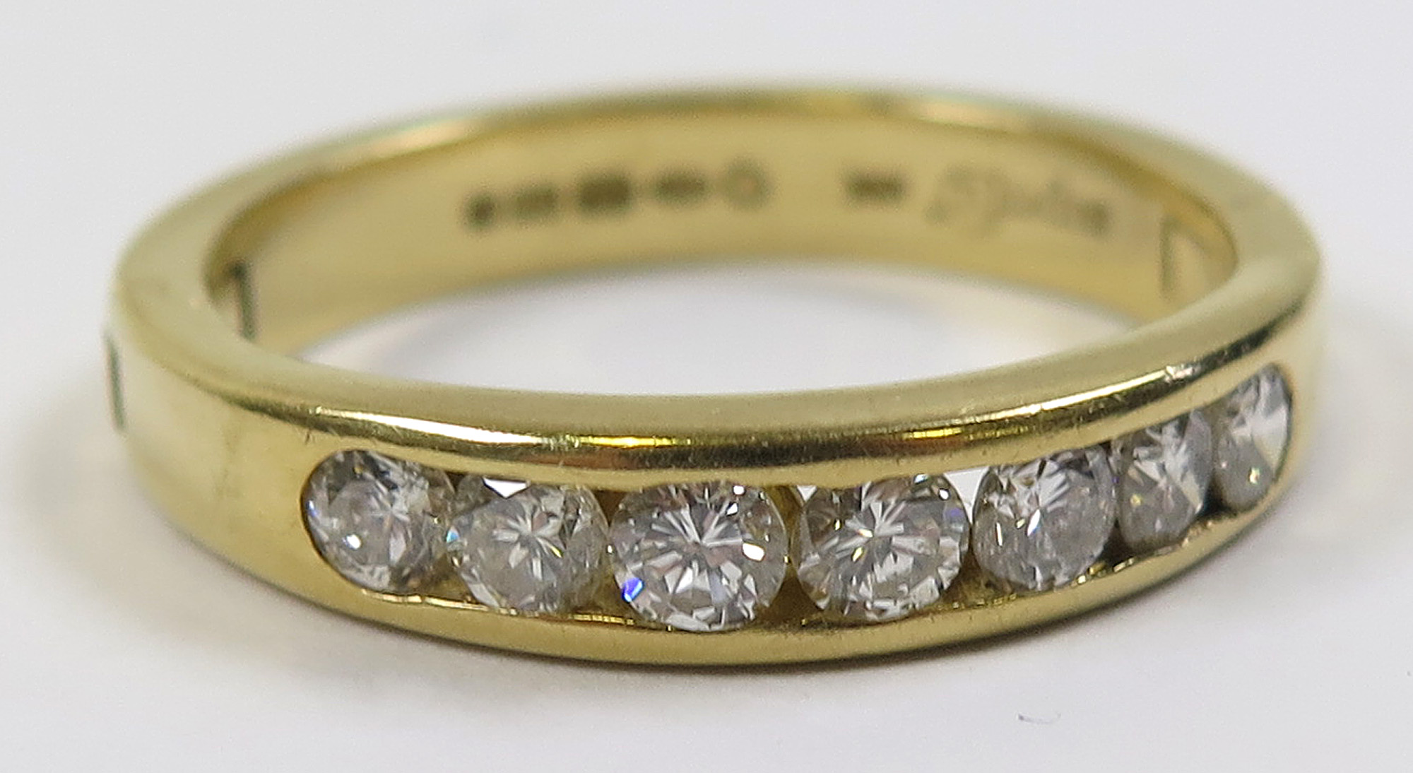 18ct 7 stone Channel set Diamond Ring approx. 0.70ct weight size U weight 7.8 grams