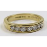 18ct 7 stone Channel set Diamond Ring approx. 0.70ct weight size U weight 7.8 grams