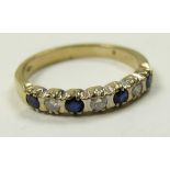 Yellow metal 7 Stone Sapphire and Diamond Ring size L weight 1.8 grams