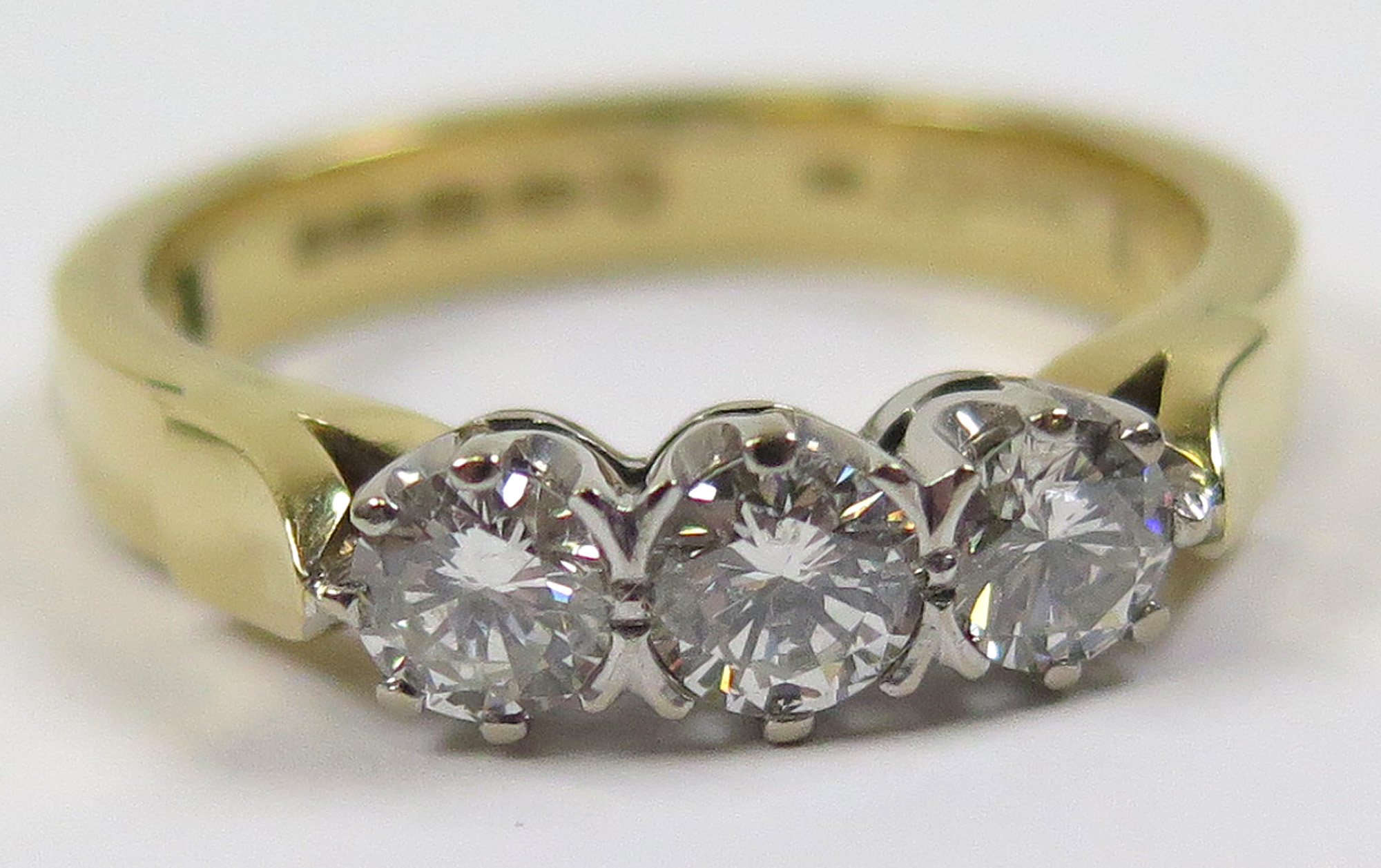 18ct 3 stone Diamond Ring approx. 1.00ct weight size V weight 9.2 grams