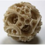 19th century Chinese puzzleball carved in Ivory with multiple balls inside. Deep carving and 4cm