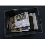 Coin covers / presentation packs in a stacker box , a good mixture with later dates seen