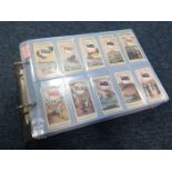 Album of 14 sets of Military Cigarette Cards, Life On Board A Man of War. Naval Dress and Badges,