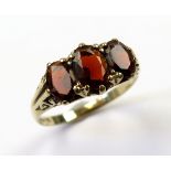 9ct Gold Ring set with 3 large Garnets size N weight 2.5 grams