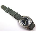 CWC military stainless steel gentleman`s wristwatch, Army issue dated 1976. The black dial with