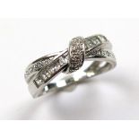 9ct White Gold Knot style Ring set with CZ size N weight 2.9 grams