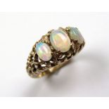 9ct Gold Ring set with 3 Opals size N weight 4.5 grams