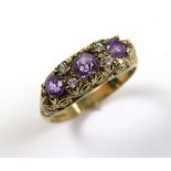 9ct Gold 3 stone Amethyst Ring size P weight 3.4 grams