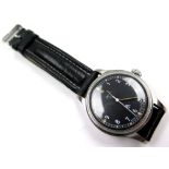 Smith military stainless steel gentleman`s wristwatch. The black dial with white arabic numerals,