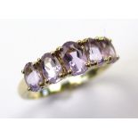 9ct Gold 5 stone Amethyst Ring size M weight 2.1 grams