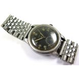 British Military issue Timor W.W.W. stainless steel manual wristwatch. The black dial having the