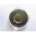 Quarter Sovereign 2009 BU in a hard plastic capsule