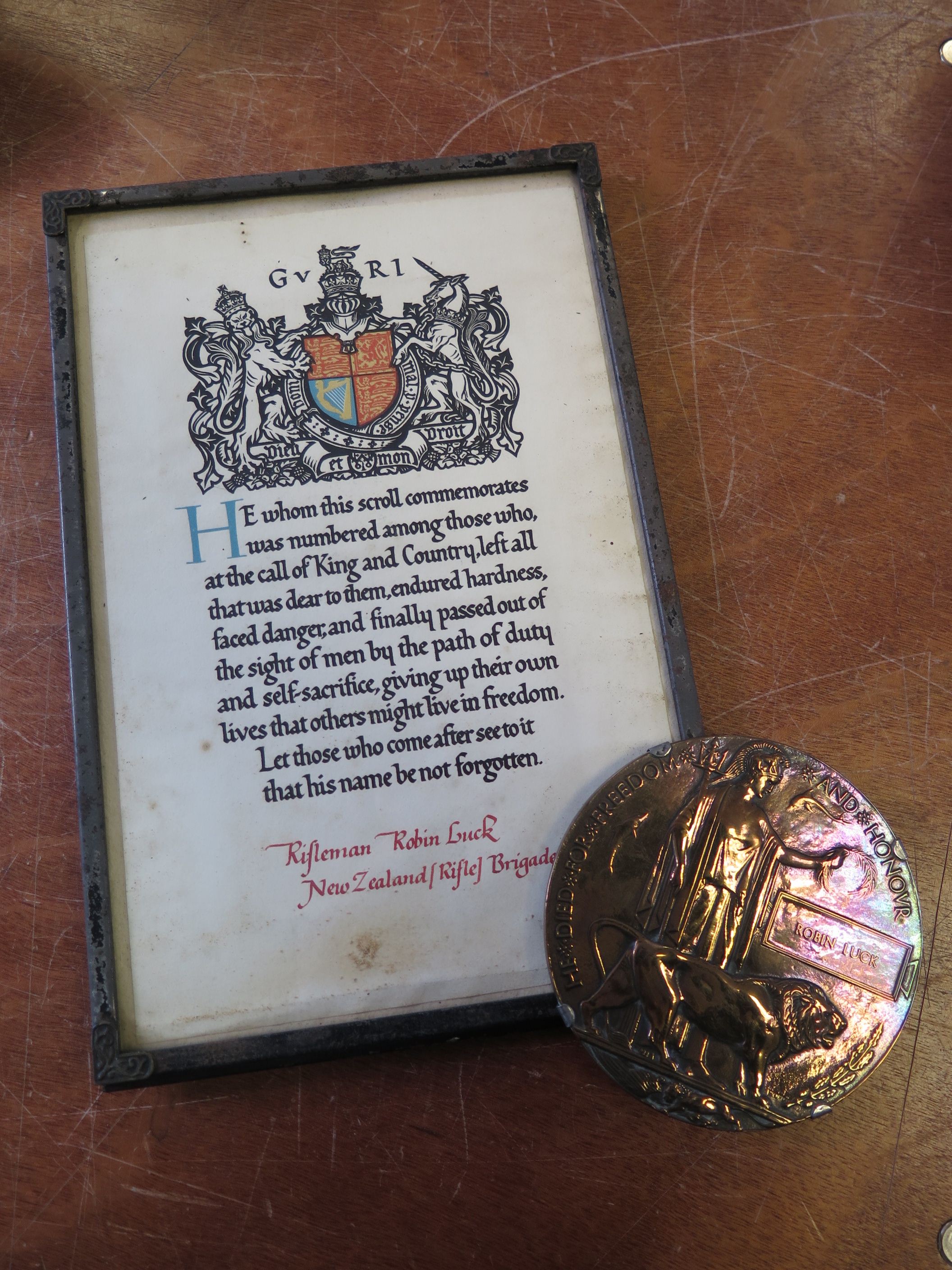 Death Plaque and Original Scroll in metal frame to Rifleman Robin Luck N.Z.R.B. Commemorated at