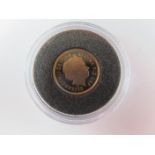 Quarter Sovereign 2010 Proof FDC in a hard plastic capsule