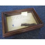 An interesting framed piece of shrapnel found on HMS Spitfire following the Jutland action on 31.