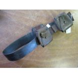 A 1903 Pattern Leather waist belt with 4x leather pouches (maker marked and dated 1909). Brass
