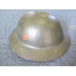 Great War ' Raw Edge' British Brodie Helmet with oilskin liner and leather chinstrap. Over